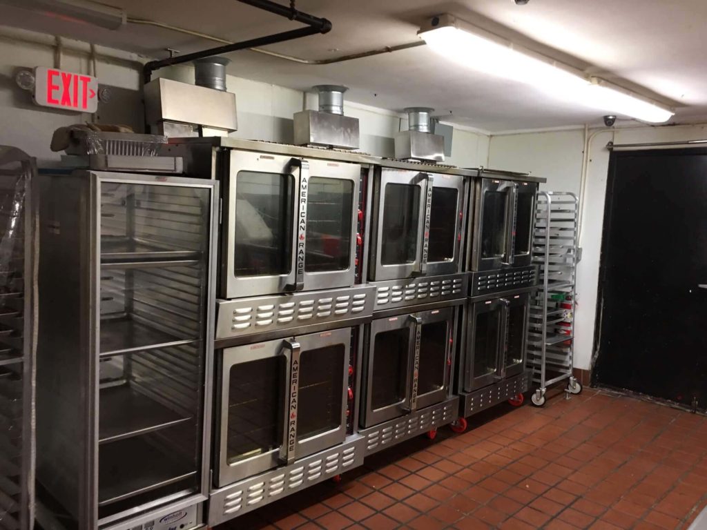 Commercial Kitchen featuring lines of commercial ovens