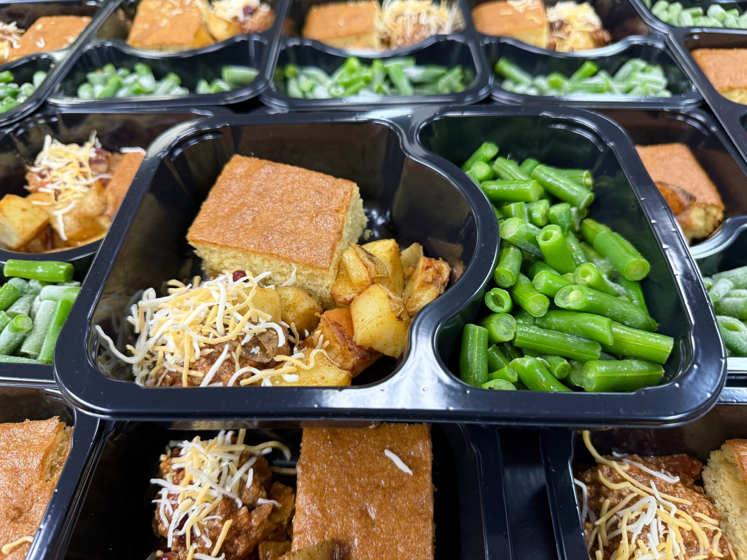 green beans, cornbread, potatoes, and chili school lunch